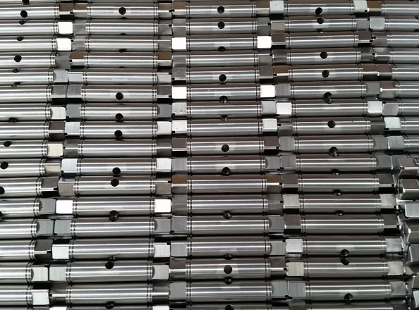 Batch of turned shaft components