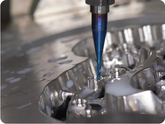 Precision inspection probe checking a machined component